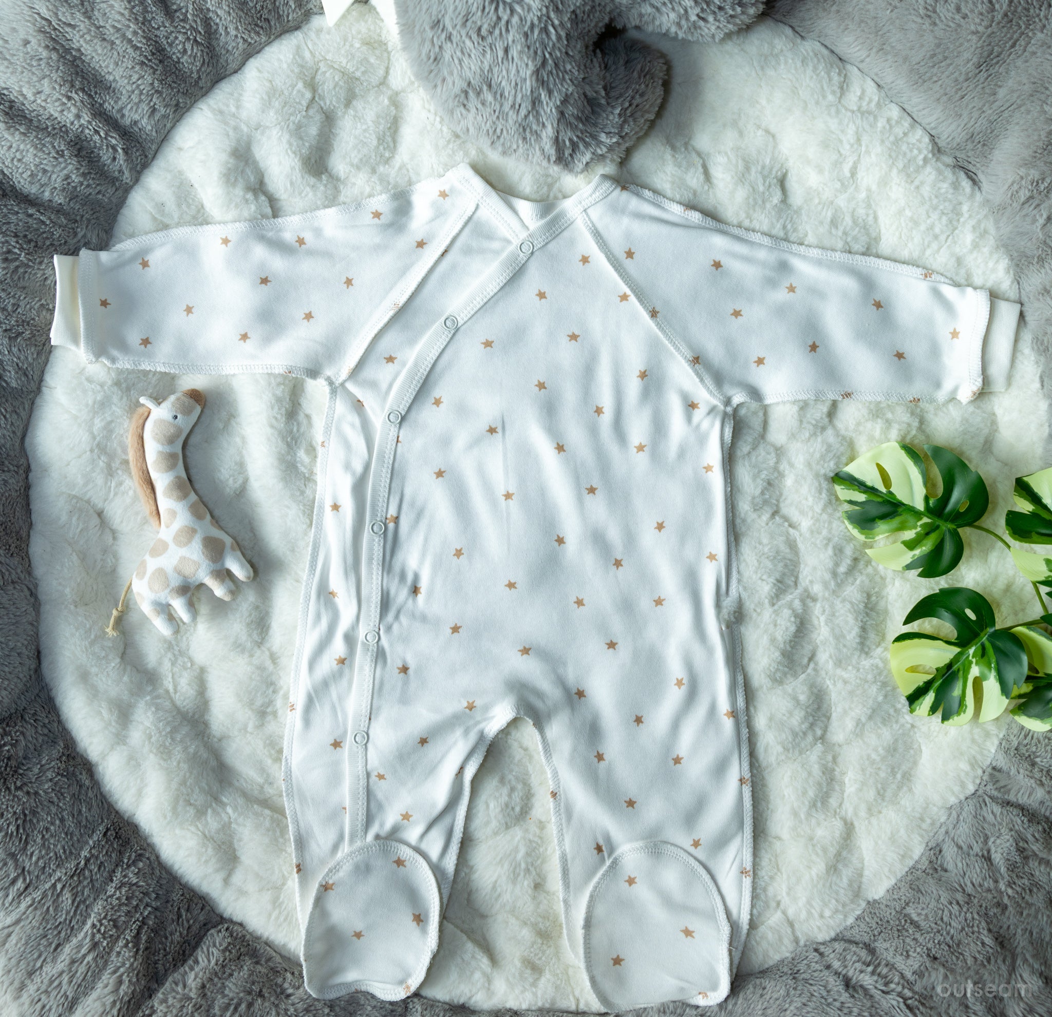 Outseam Sleepsuit Outseam - Brown Stars — soft cotton baby sleepsuit with outward seams